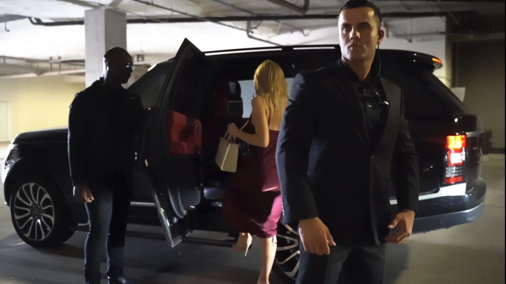 Executive Protection Houston High Net Worth Security- Meyer Defense Armed Security Guards Escort Client in Black Suits Security